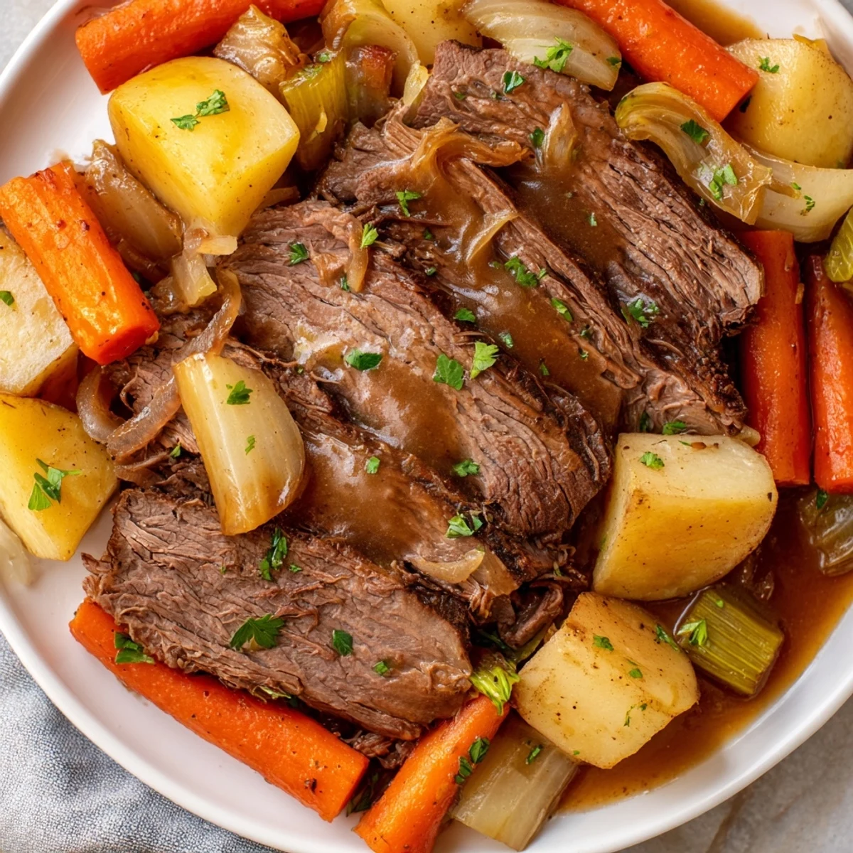 A family-style Slow Cooker Beef Pot Roast with Root Vegetables garnished with parsley and drizzled with rich gravy.