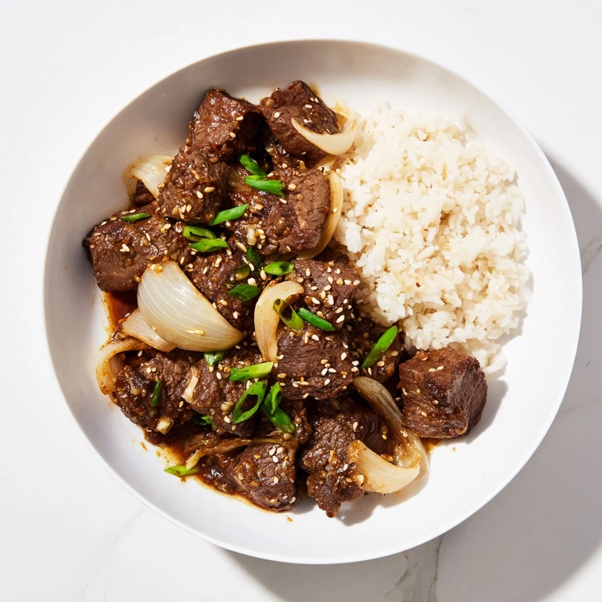 Slow-cooked Crock Pot Korean Beef with tender shredded beef in a rich, spicy-sweet sauce served over steamed jasmine rice.