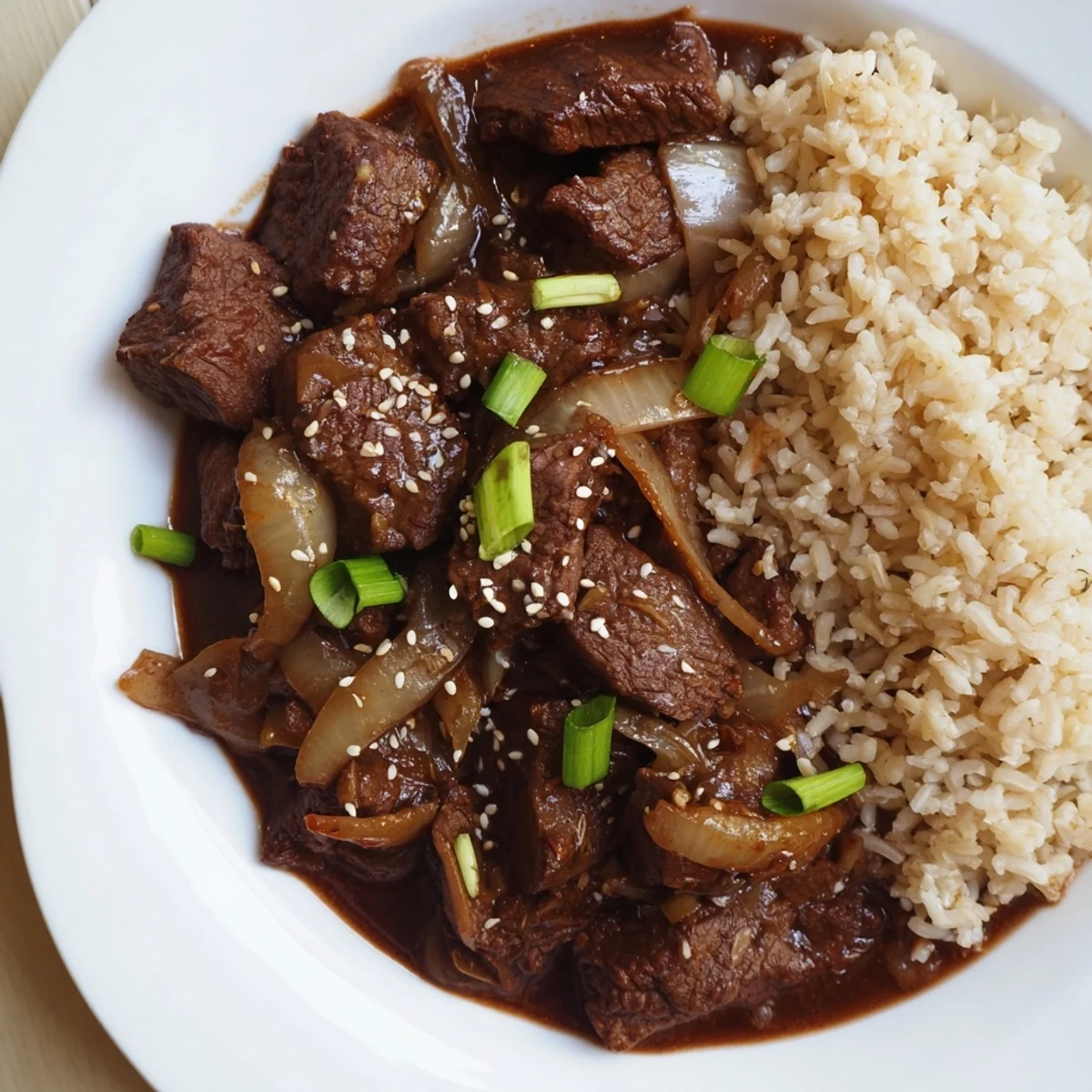 Hearty Crock Pot Korean Beef in a crock pot, glistening with savory sauce and ready to serve in lettuce wraps.