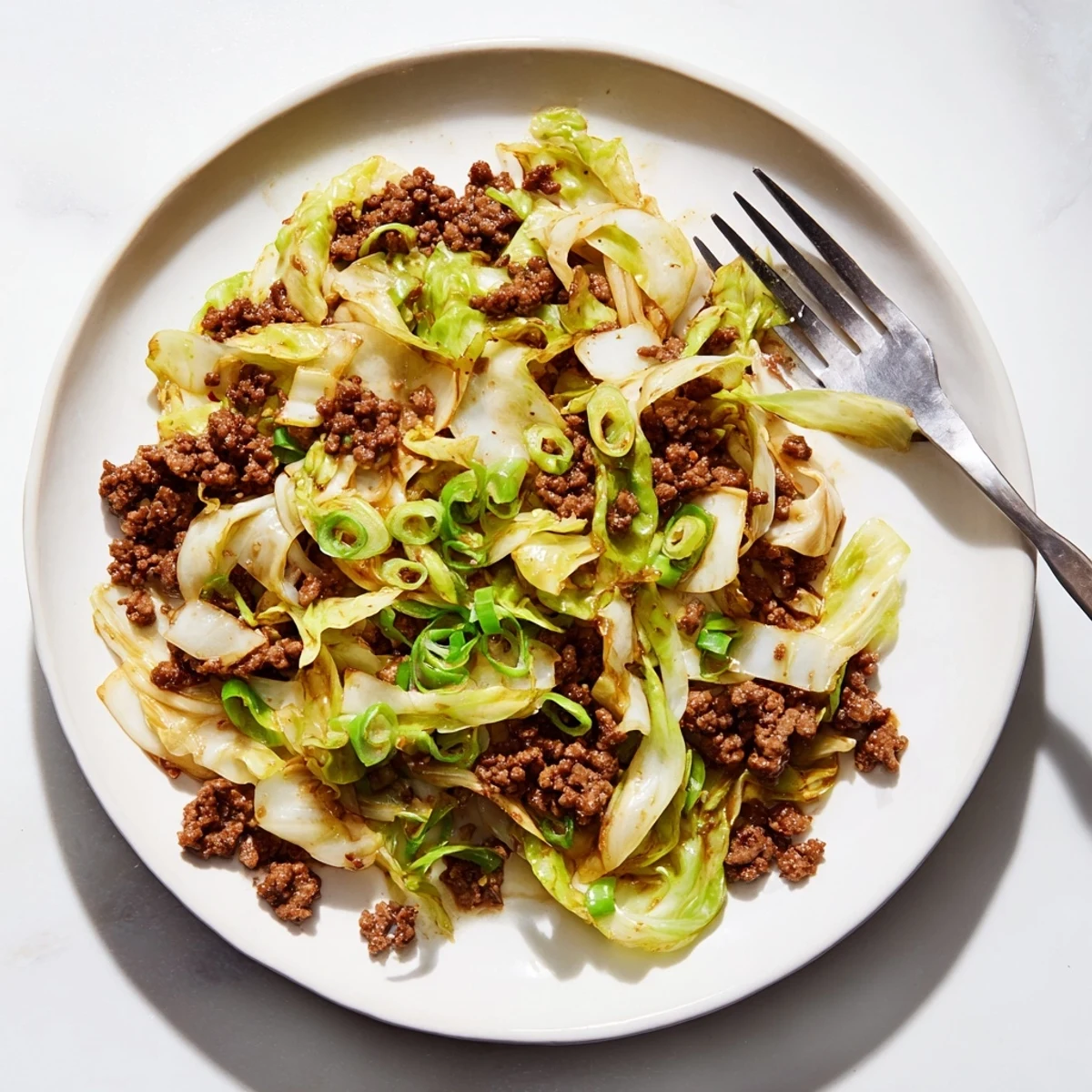 Golden brown ground beef and tender green cabbage tossed in glossy Mongolian sauce