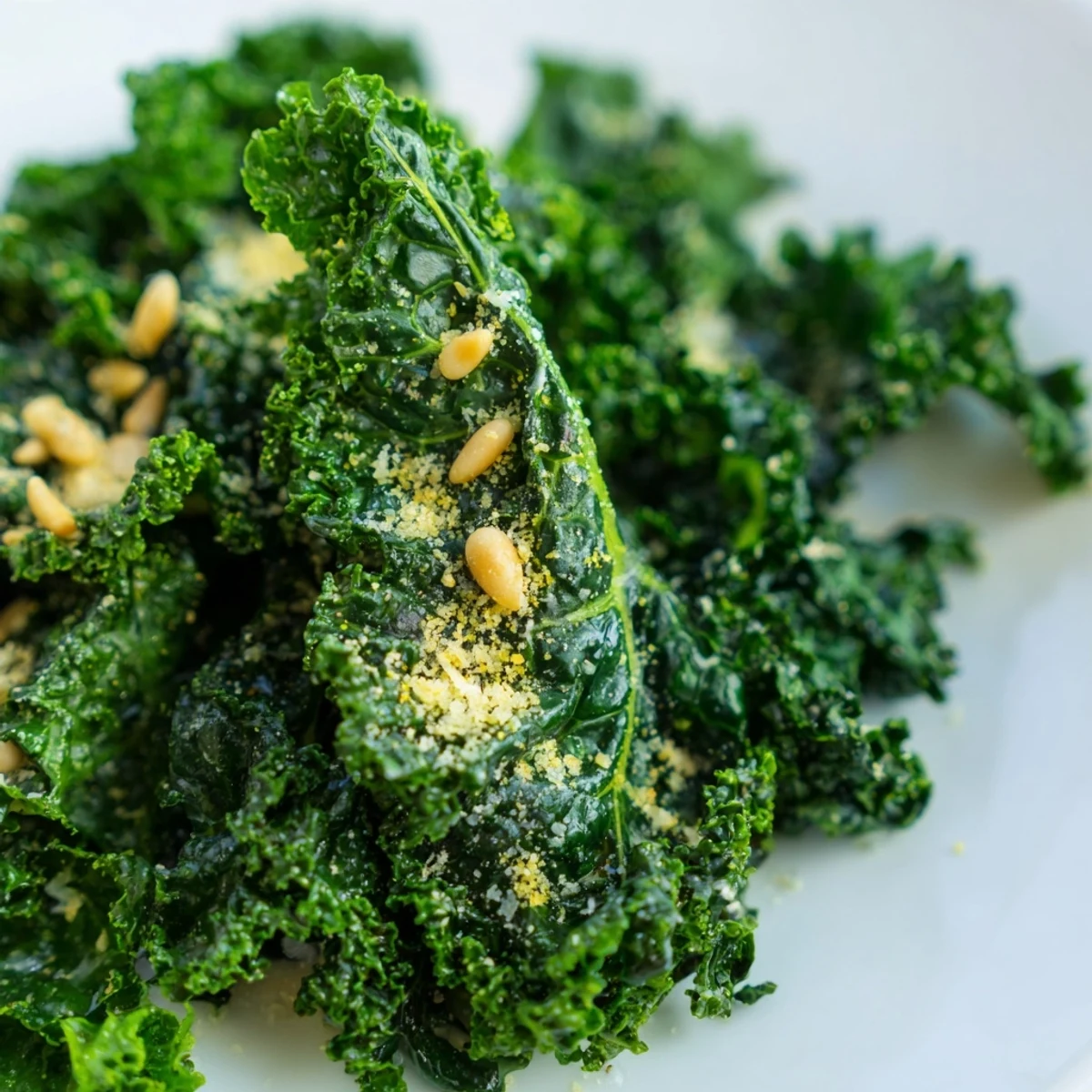 Massaged kale leaves glistening with zesty Garlic Lemon Parmesan Kale Salad dressing