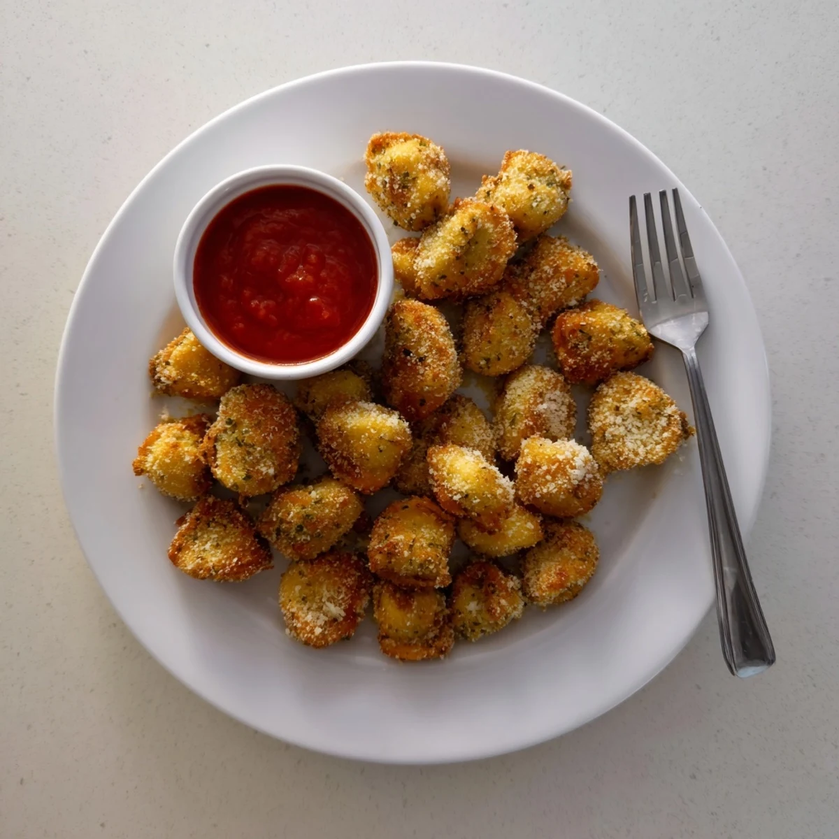 Crispy Tortellini Party Snacks Recipe showing golden, cheese-filled bites with marinara.