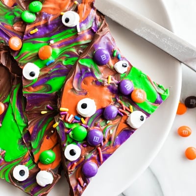 Dark and white chocolate Melting Witches Bark topped with spooky candy eyes