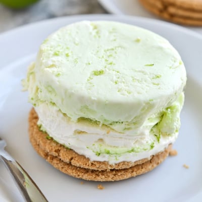 Homemade Key Lime Pie Ice Cream Sandwiches chilled on parchment, ready to serve